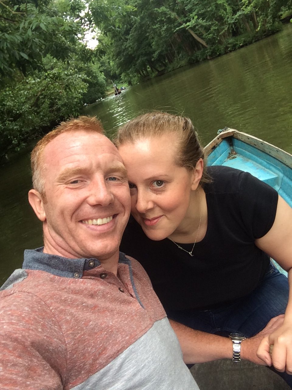 Kim and Si enjoying a boat ride together